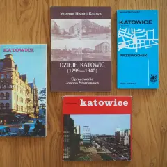 Książki o historii i przewodniki po Katowicach. Jedna z nich to "Dzieje Katowic (1299-1945)", inna to "Katowice i okolice", a kolejna to przewodnik po mieście.